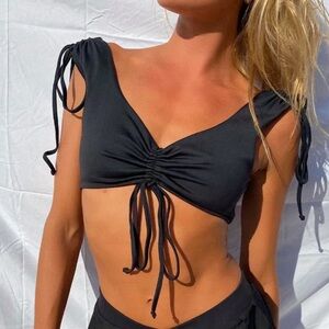 Frankie’s bikinis black “Windy” ruched crop top. Size S. Brand new with tags!